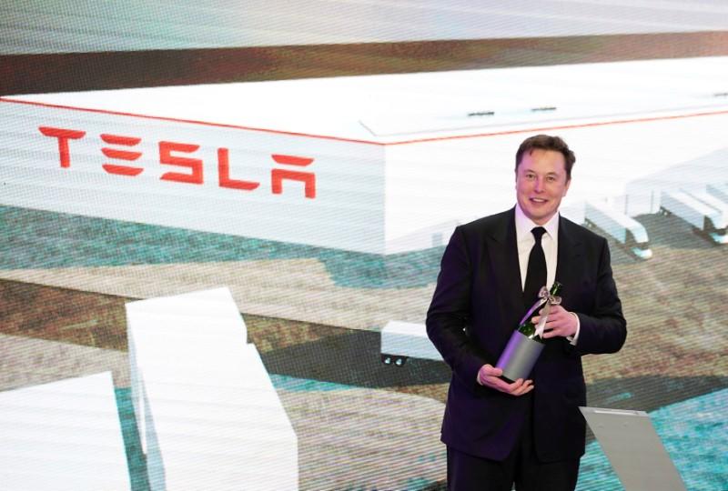 Tesla says it plans to open China design and research