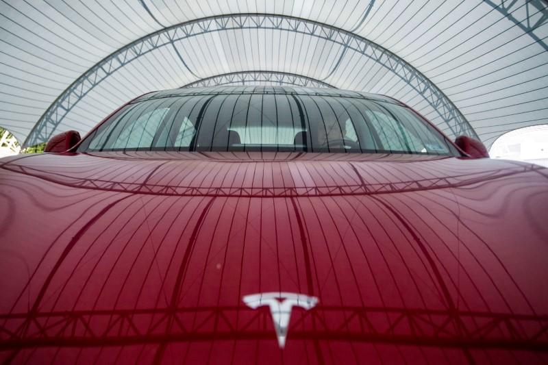 Tesla's furious rally pushes market value past $100 billion -