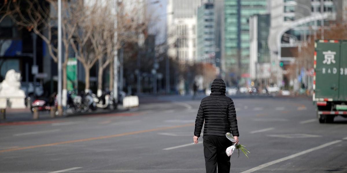 Barren streets but bustling stock markets in virus-stricken China -