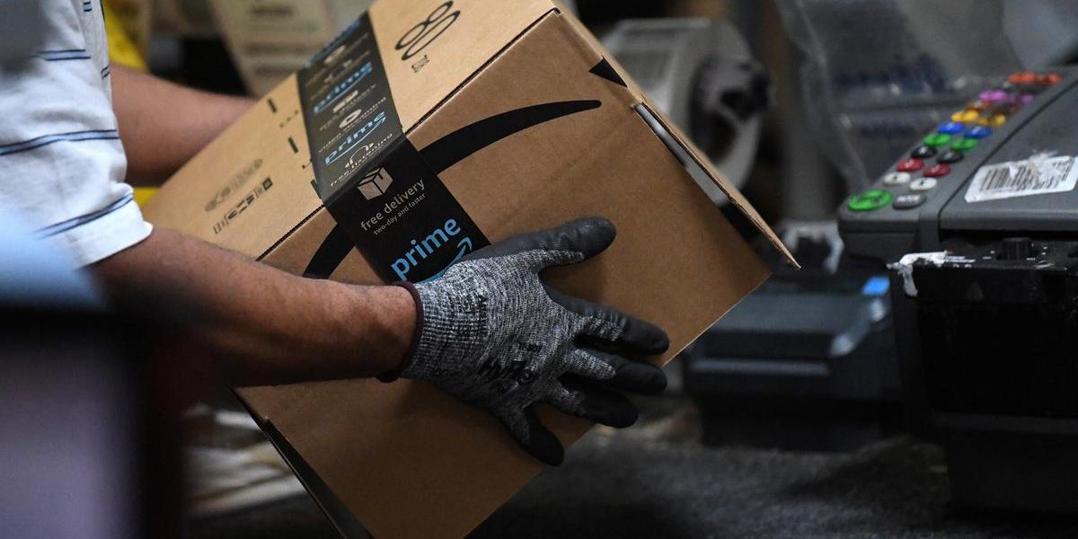 Amazon to hire 100,000 workers as online orders surge on