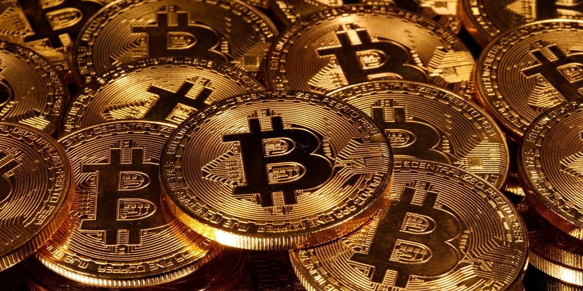 Bitcoin surges a fifth as markets rebound, still down a