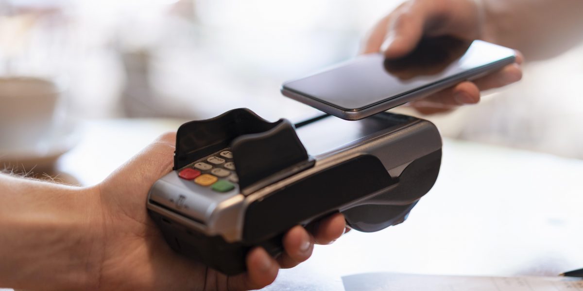 gettyimages-1161369864-contactless-phone-payment.jpg