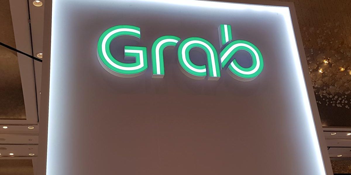 Softbank-backed Grab prepares for 'long winter' as virus hits revenue
