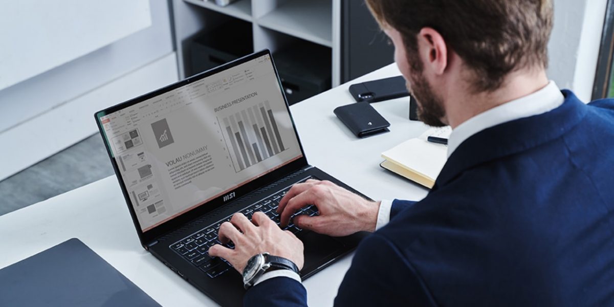 Summit-with-man-at-laptop-compressed-2.jpg